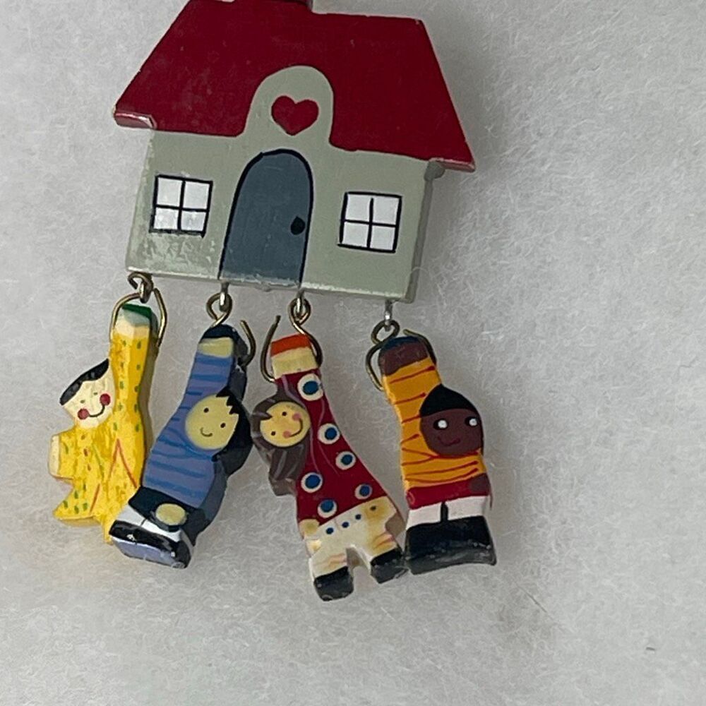 Artisan multicultural wooden school children brooch.